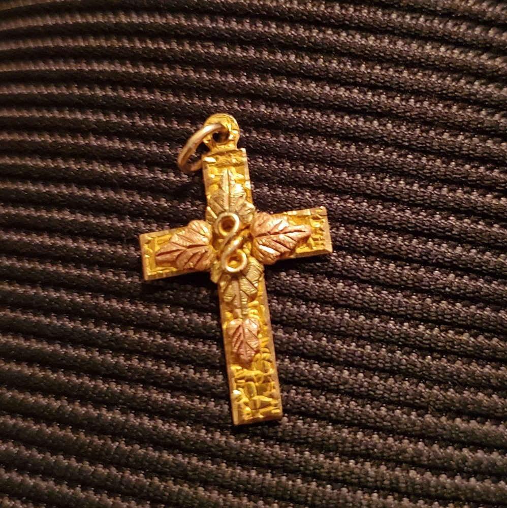 Golden cross pendant